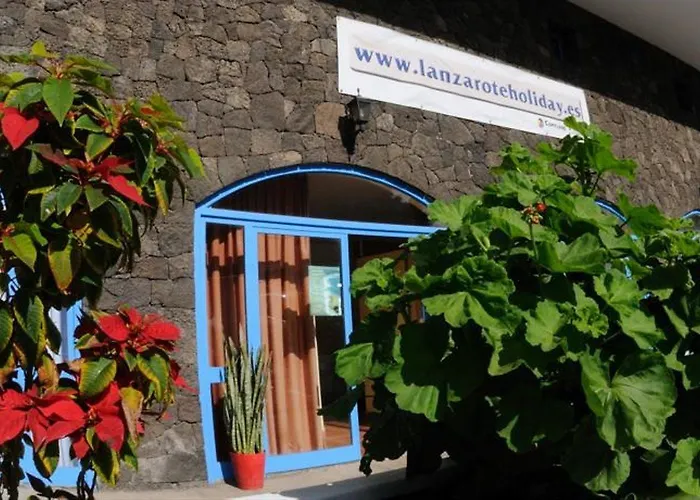 Costa Volcan & מלון דירות פוארטו דל כרמן